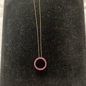 10k yellow gold ruby necklace.